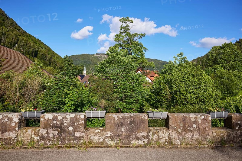 Old bridge with stone wall and flower boxes in the historic district of Geschwend, Todtnau, Black Forest, district of Lorrach, Baden-Württemberg, Germany, Europe