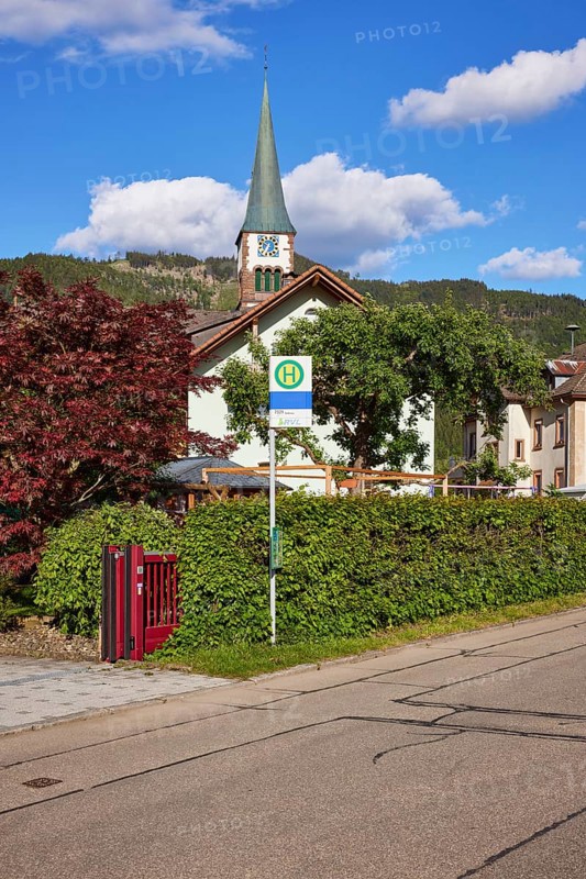 Church of St. Wendelin and bus stop in the centre of the historic district of Geschwend, Todtnau, Black Forest, district of Lorrach, Baden-Württemberg, Germany, Europe
