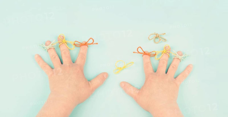 Alzheimer awareness day, dementia diagnosis, Parkinson disease, memory loss disorder, damaged brain, bow on finger as reminder