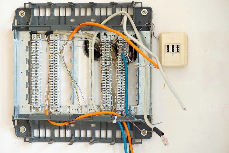 Cable junction box for connection of the computer to the internet and telephone, broken electricity, old network station
