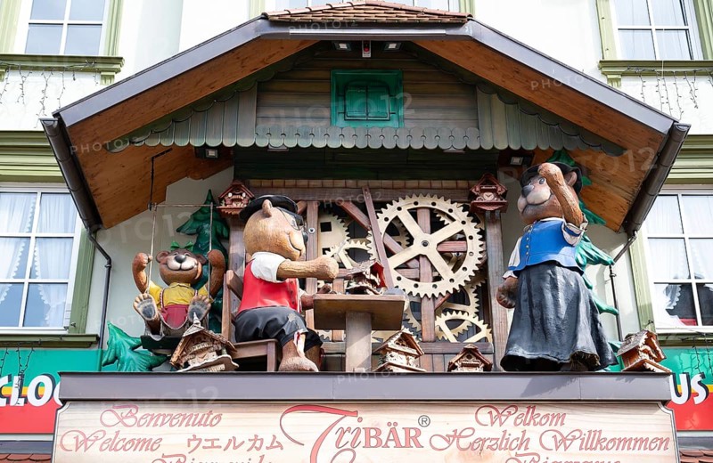 Cuckoo clock with bears at a shop in the Black Forest, Triberg in Germany, traditional craft, vintage wood carving, 30.03.2024