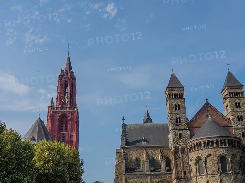 View of the towers and the roof of a historic cathedral under a clear sky, Maastricht, limburg, netherlands
