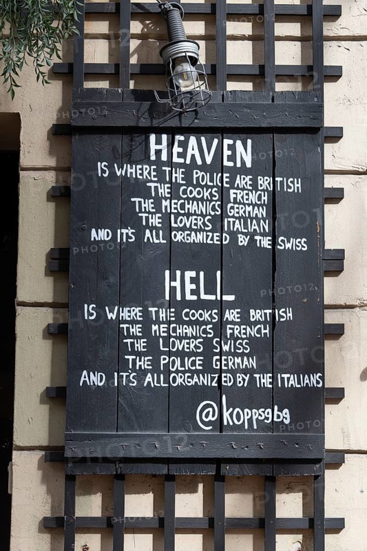 Heaven and hell, slogan on black-painted wooden slats, Gothenburg, Västra Gotalands län, Sweden, Europe