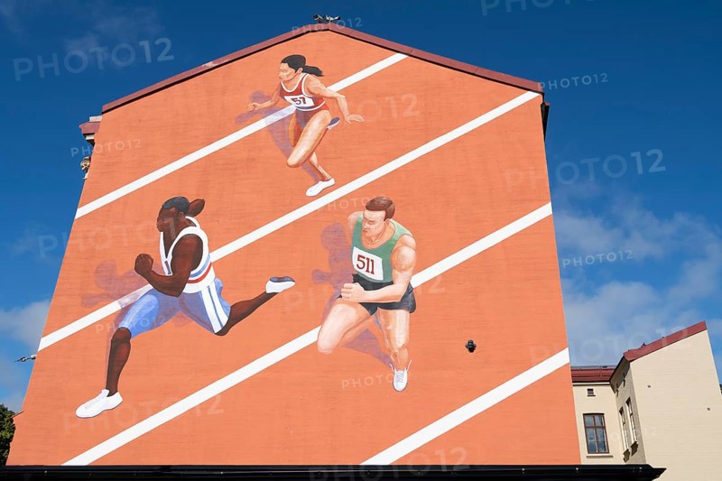 Runner on tartan track, painted house wall, Änggarden neighbourhood, Majorna-Linné district, Gothenburg, Västra Gotalands län province, Sweden, Europe