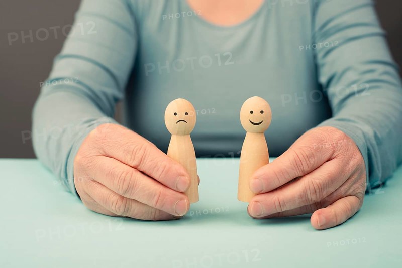 Mind with a sad and a happy face, mental health concept, positive and negative thinking, self esteem and perception, emotion
