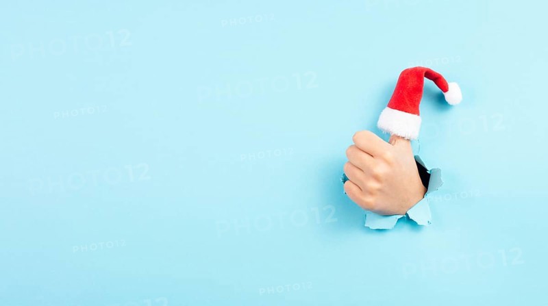 Thumb up, Santa Claus hat, Christmas holiday, positive hand gesture, optimism and emotion, winter season