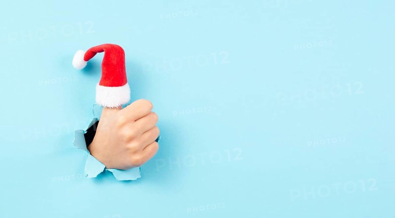 Thumb up, Santa Claus hat, Christmas holiday, positive hand gesture, optimism and emotion, winter season