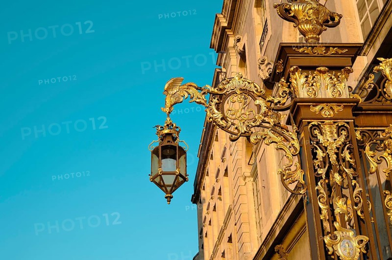 Lantern from place Stanislas in Nancy, France, golden streetlight in departement Lorraine, Europe