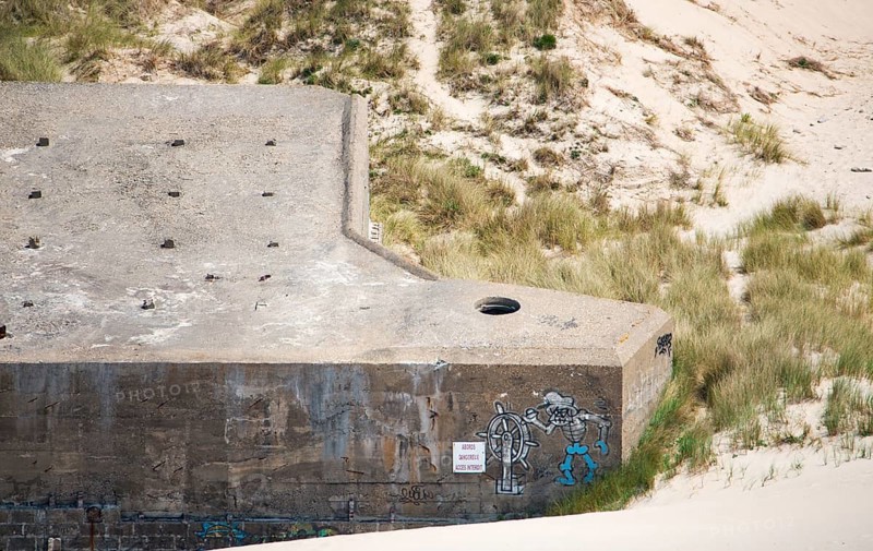 Ruin of a german bunker in Normandy, France from the Second World War, D-Day military invasion by the allies, history of Europe