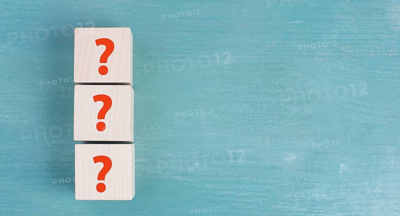 Question marks on wooden cubes, question and answer, meeting and discussion concept, costumer service