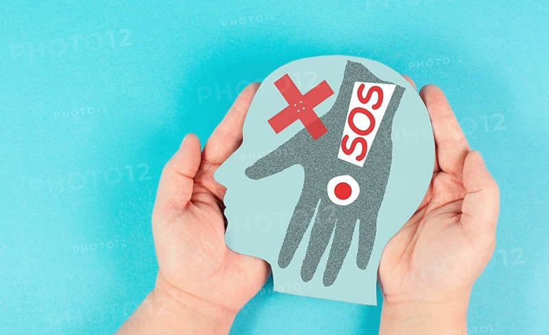 Domestic violence, hand hits face, sos on exclamation mark, international awareness month october for victims and survivors