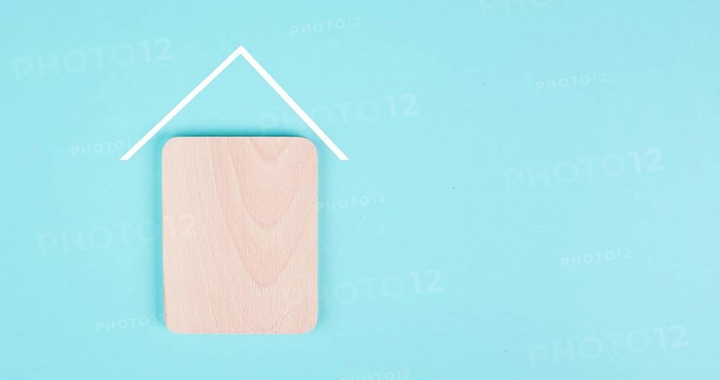 Wooden house with a roof, planning to build or rent a new home, real estate, owning property