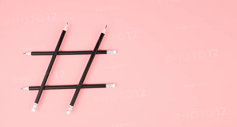 Hashtag made from pencils, social media communication, influencer and followers, viral content trend