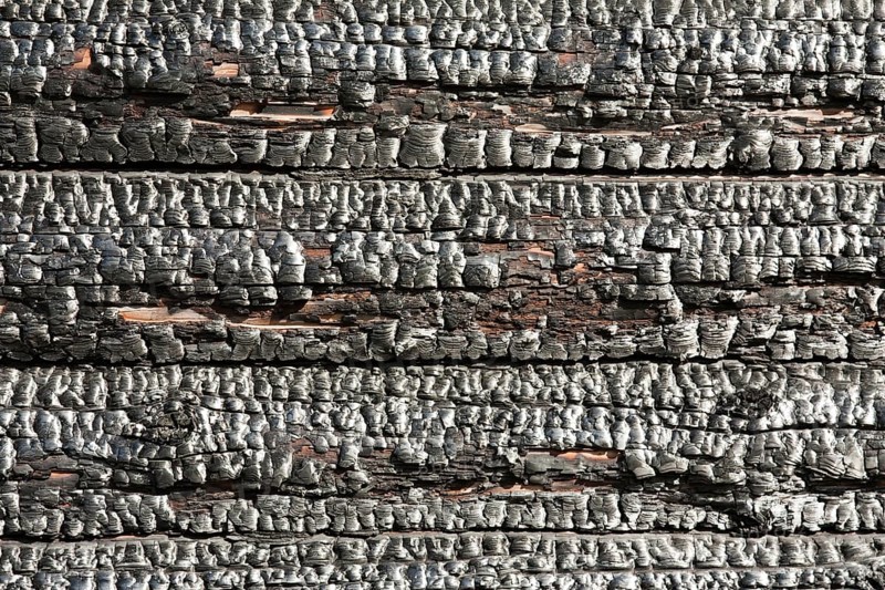 Fire heat burnt black coal ruined wood log house