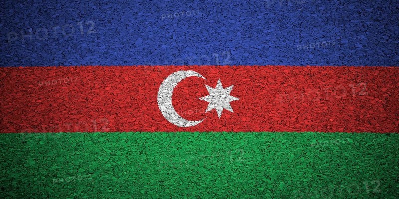 The Azerbaijani flag painted on a cork board