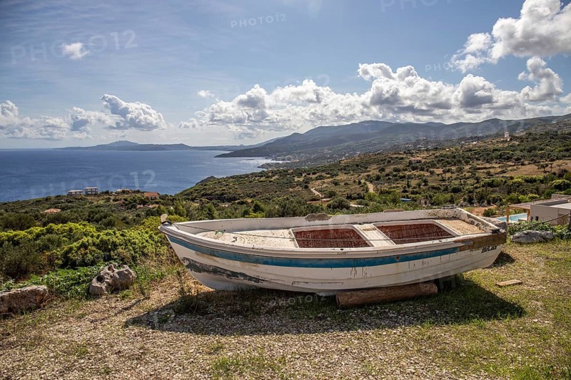 A great typical Greek landscape, the Mediterranean nature of Greece. Landscape shot of a bay with boat. Twilight on Zakynthos, Ionian Islands, Greece, Europe