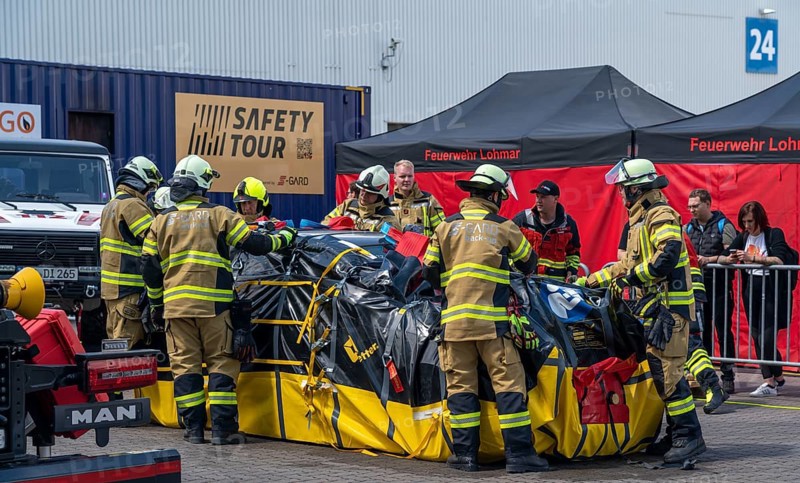 Interschutz 2022 trade fair in Hanover, the world's largest trade fair for fire, rescue and disaster control technology, equipment, over 1300 exhibitors from 50 countries, packaging of electric vehicles after a battery fire, in a fireproof cover for safe transport