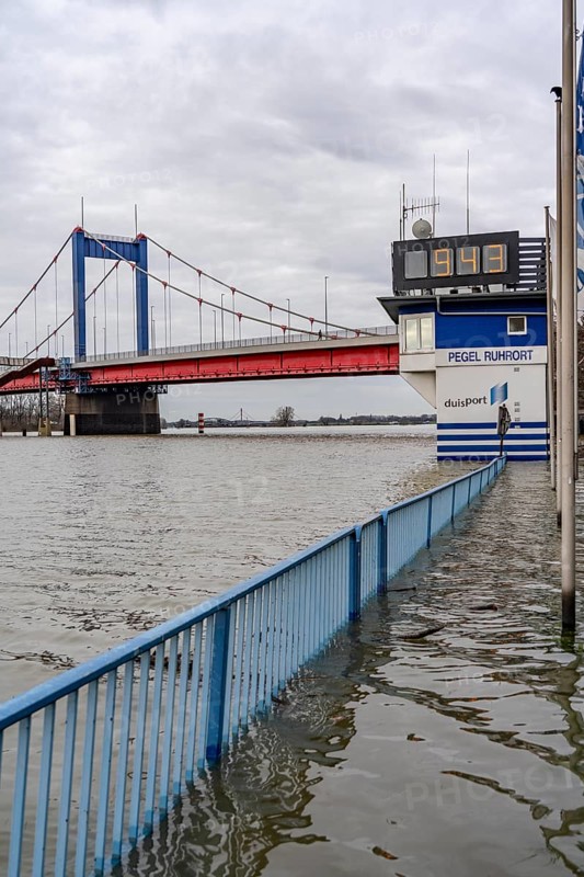 High water on the Rhine near Duisburg, river gauge house, Rhine gauge, Friedrich-Ebert-Bridge, washed over by high water, North Rhine-Westphalia, Germany, Europe