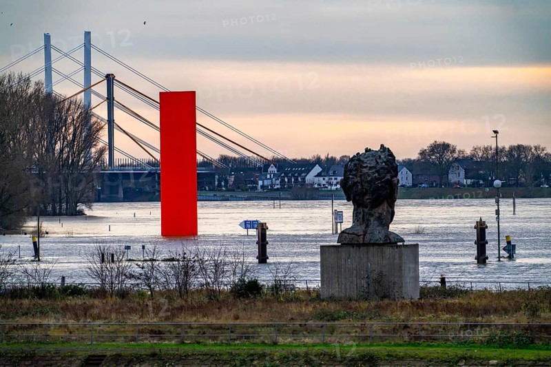Flood on the Rhine near Duisburg, Rhine bridge Neuenkamp, old and new construction, landmark Rhine orange, washed by the flood, sculpture The Echo of Poseidon, on Mercator Island, washed by the flood, North Rhine-Westphalia, Germany, Europe