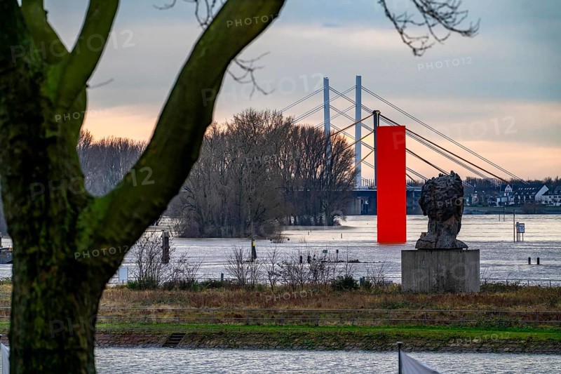 Flood on the Rhine near Duisburg, Rhine bridge Neuenkamp, old and new construction, landmark Rhine orange, washed by the flood, sculpture The Echo of Poseidon, on Mercator Island, washed by the flood, North Rhine-Westphalia, Germany, Europe