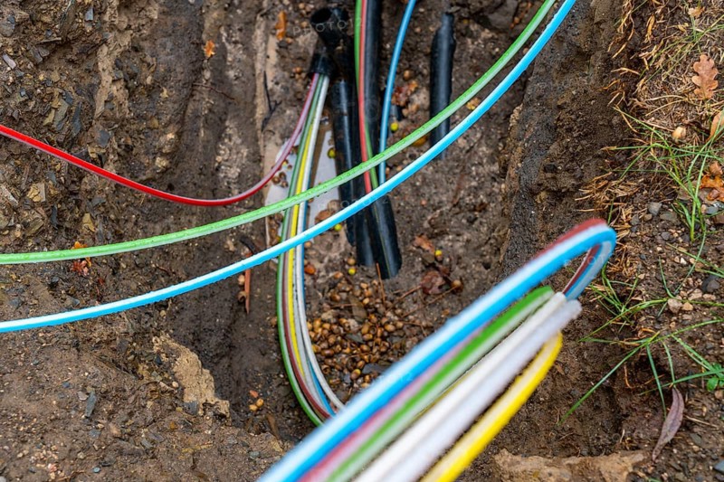 Laying of fibre optic cables, construction site, excavation pit, connection for fast Internet, near Waldeck, Hesse, Germany, Europe