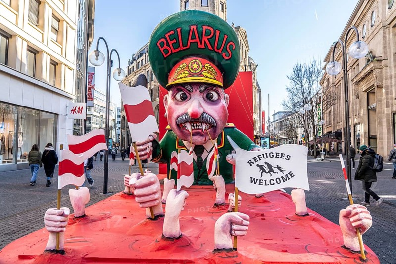 Rose Monday in Cologne, street carnival, the Rose Monday parade was cancelled due to the Corona crisis, the themed floats are distributed in the city centre, refugee crisis caused by the politics of Belarus, Cologne, North Rhine-Westphalia, Germany, Europe