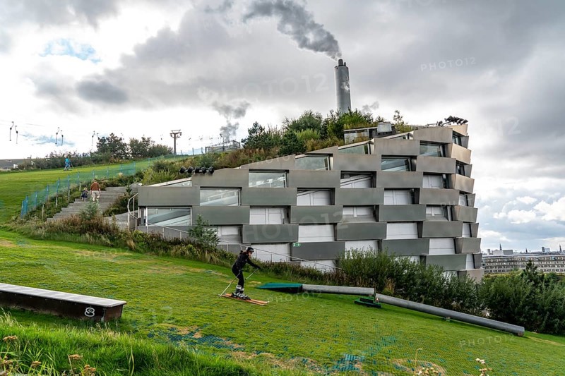 CopenHill, waste incineration plant and artificial ski slope, skiing with a view of the ski lift, 90 metres high and 400 metres long slope on artificial turf, Copenhagen, Denmark, Europe