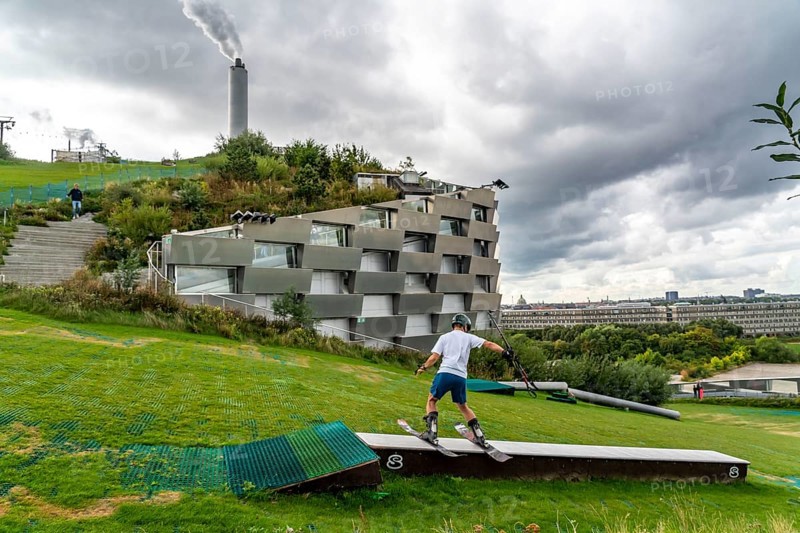 CopenHill, waste incineration plant and artificial ski slope, skiing with a view of the ski lift, 90 metres high and 400 metres long slope on artificial turf, Copenhagen, Denmark, Europe