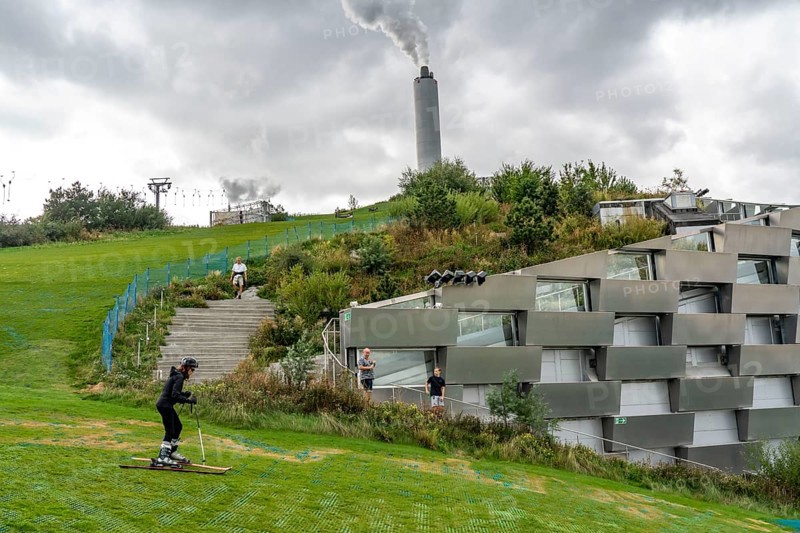 CopenHill, waste incineration plant and artificial ski slope, skiing with a view of the ski lift, 90 metres high and 400 metres long slope on artificial turf, Copenhagen, Denmark, Europe