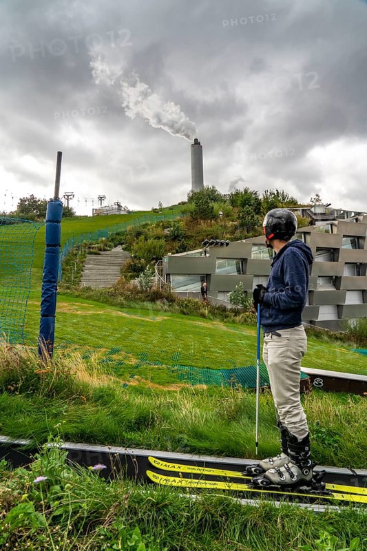 CopenHill, waste incineration plant and artificial ski slope, skiing with a view of the ski lift, 90 metres high and 400 metres long slope on artificial turf, Copenhagen, Denmark, Europe