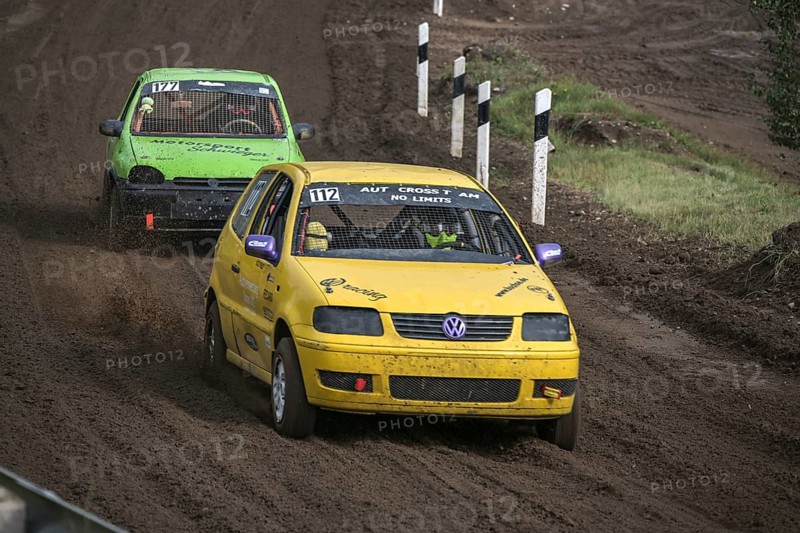 Grambek, Germany, September 10, 2022: Car racing Autocross ADAC NAX-Club Moelln, two special vehicles on the race track of dirt and soil, copy space, selected focus, motion blur, Europe