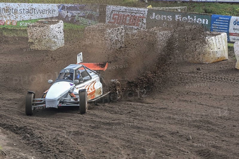 Grambek, Germany, September 10, 2022: Car racing Autocross ADAC NAX-Club Moelln, special buggy on the race track of dirt and soil, copy space, selected focus, motion blur, Europe