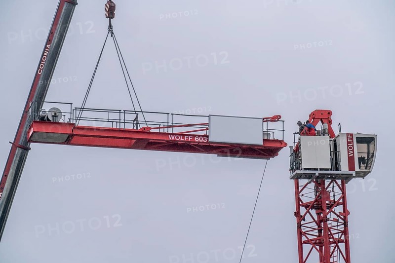 Dismantling of a large construction crane, on a large construction site, housing construction, shell construction is completed, Essen, North Rhine-Westphalia, Germany, Europe