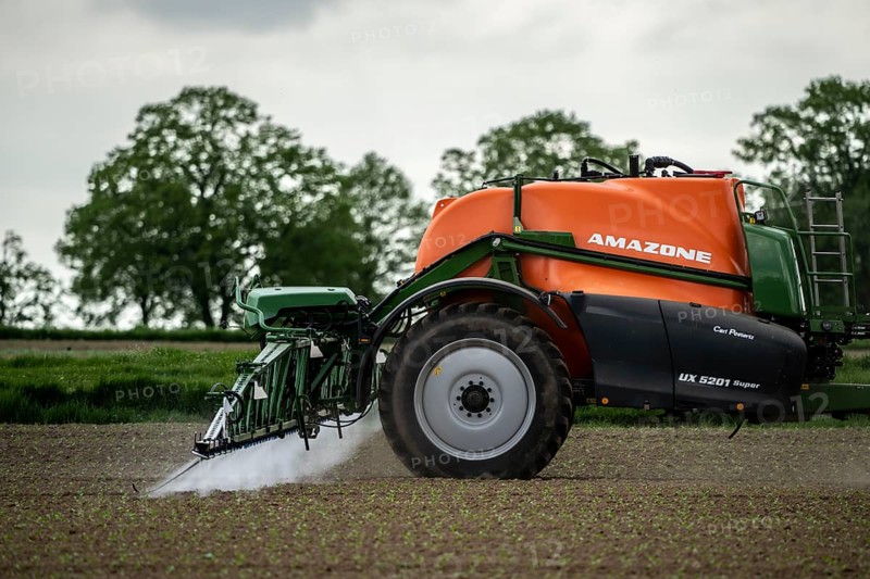 Agriculture, pesticide being sprayed on a field, sugar beet seedlings, North Rhine-Westphalia, Germany, Europe