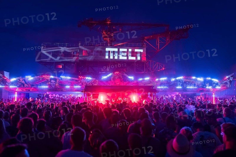 Festival visitors celebrate between bumper cars and excavators at the Melt Festival in Ferropolis on 12 July 2024. After a total of 27 years, the festival will take place for the last time in 2024