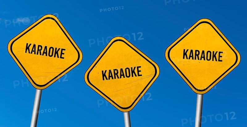 Karaoke, yellow signs with blue sky