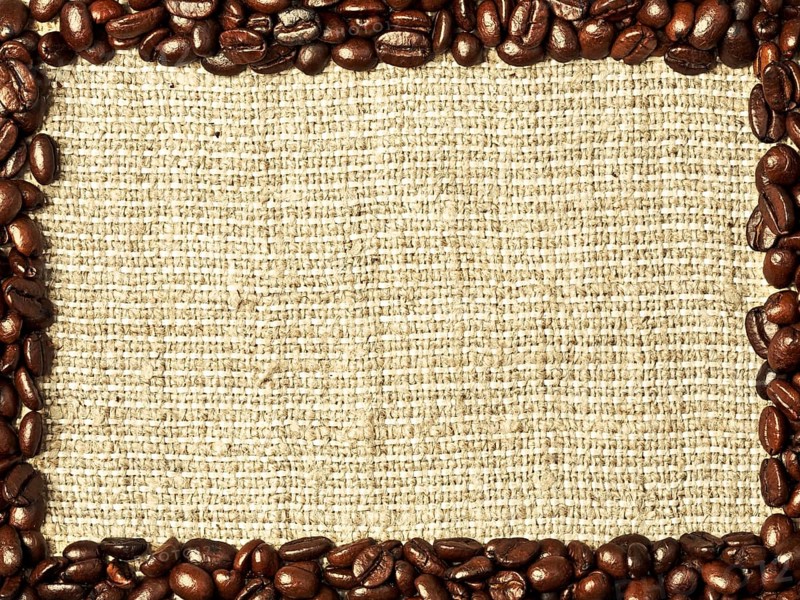 Frame from coffee beans on burlap background