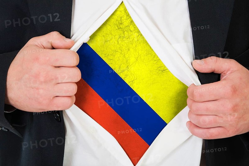 The Colombian flag painted on the chest of a man