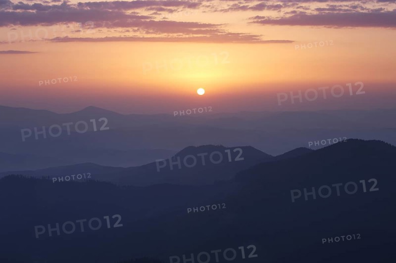 Rising sun under Carpathian mountains, Ukraine, Europe