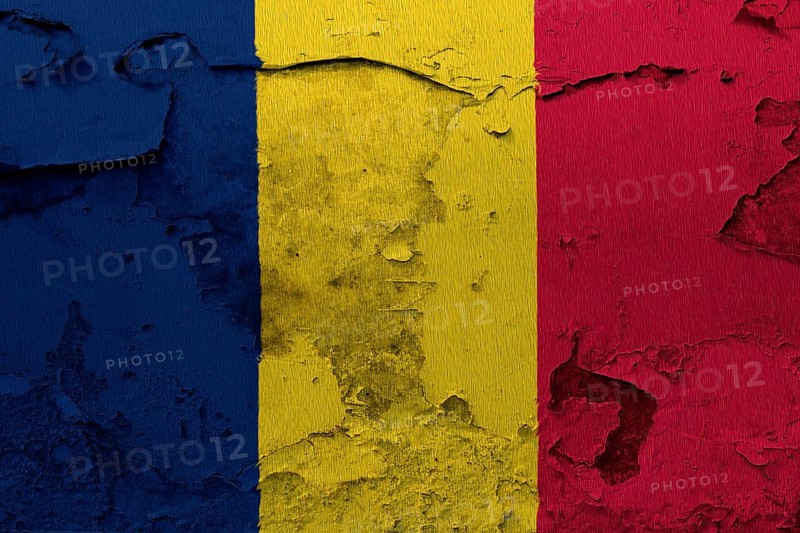 Chad flag painted on the cracked grunge concrete wall