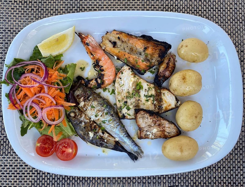 Fish platter, grilled fish, sardines, tuna, salmon, swordfish, squid, octopus, potatoes, vegetables, food, Algarve, Portugal, Europe