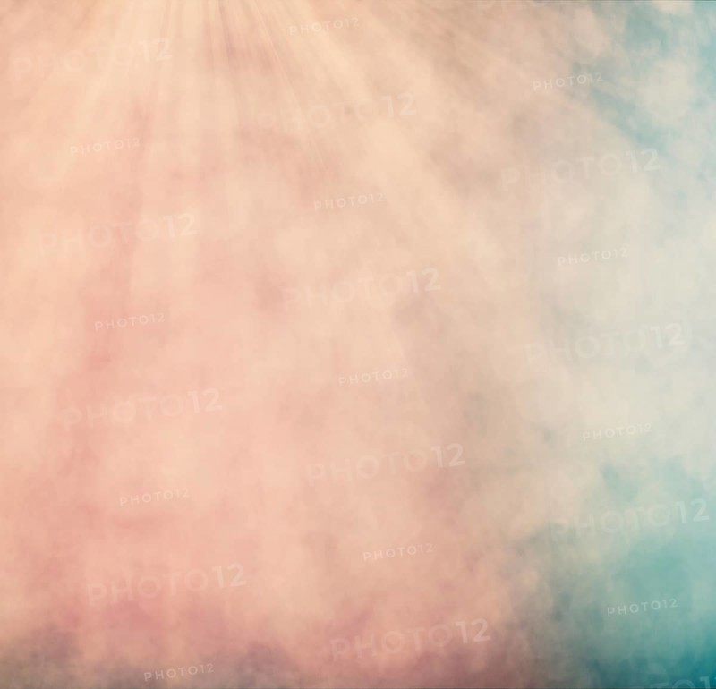 Pastel colored bokeh background with defocused round lights and sunbeams, flare overlay