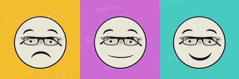 Head with a sad and a happy face, mental health concept, positive and negative mindset, depression, support and evaluation symbol, emotion