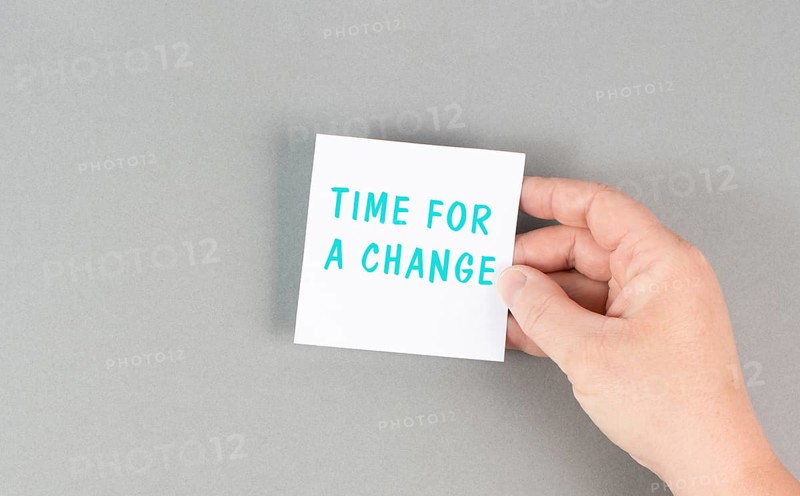 The phrase time for a change is standing on the paper, starting a new business or education goal, positive motivation and coaching concept