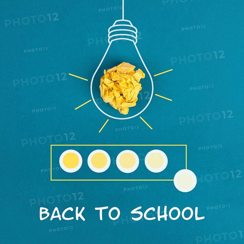 Lightbulb with crumpled paper and a loading bar, the phrase back to school is standing below, education concept