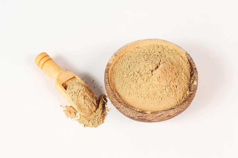 Healing earth powder in a bowl, supplement and antioxidant for to detox the body, alternative medicine