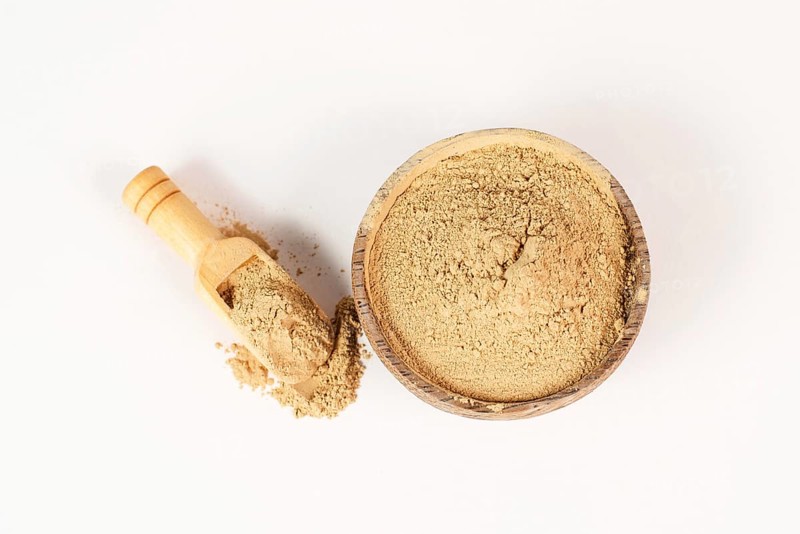 Healing earth powder in a bowl, supplement and antioxidant for to detox the body, alternative medicine
