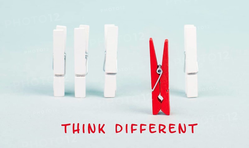 Group of clips, red person thinks different and takes the opposite direction, against the stream symbolic, courage and winner concept