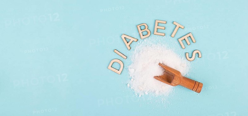 Shovel with white refined sugar, health problems by diabetes, insulin resistent, unhealthy food, addiction to sweets