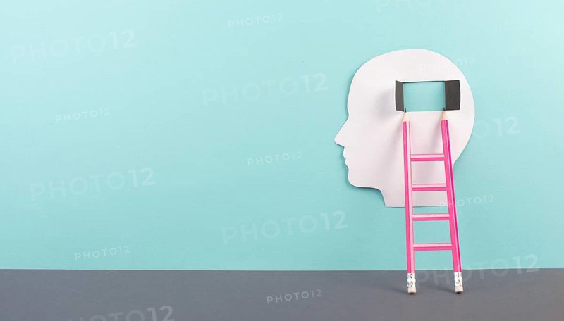 Holding two pieces of a puzzle in the hands, connecting together as a team, solving a problem, strategy and communication concept